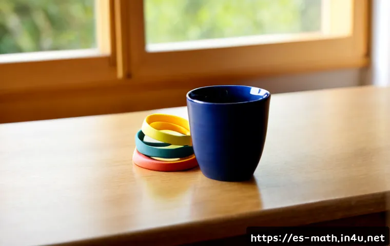 위상수학과 고무 밴드 이론 - Photorealistic educational tabletop scene illustrating topology through rubber bands: two colorful r...